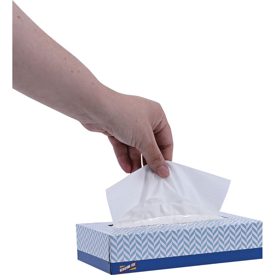 Tissue being pulled from the box