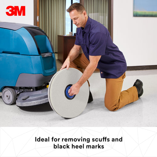 3M white polish pad on a floor machine