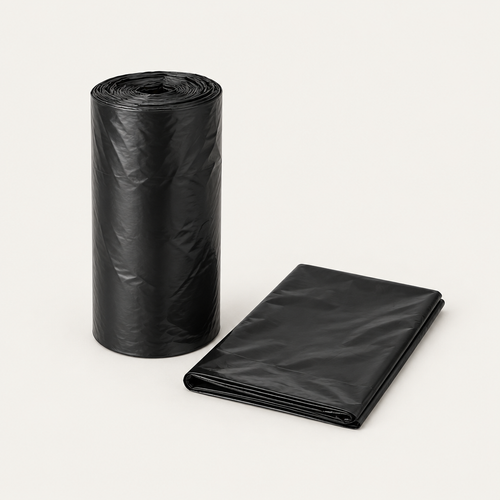 Roll of black 1.5 mil can liners with one liner folded beside it