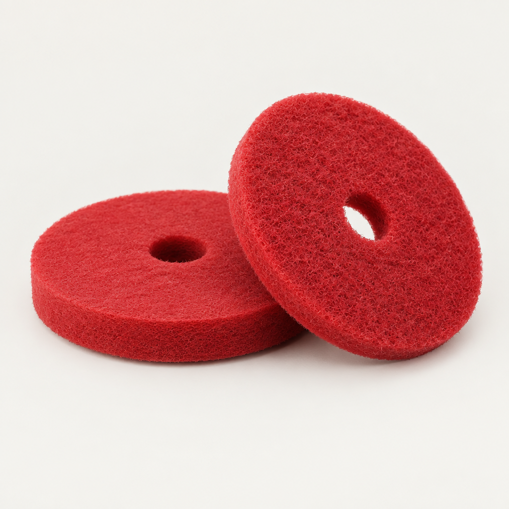 Red circular floor buffing pads