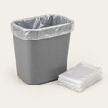 Clear liner in a desk-side waste basket
